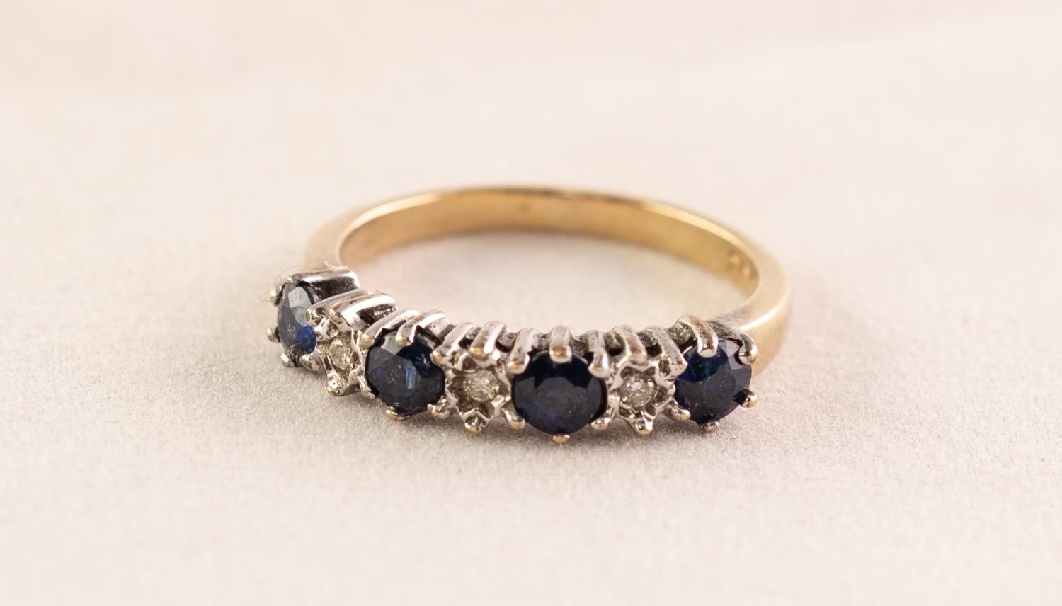 UNMARKED YELLOW GOLD HALF-HOOP RING set with four sapphires and three tiny diamonds,2.4 gms gross - Image 2 of 3