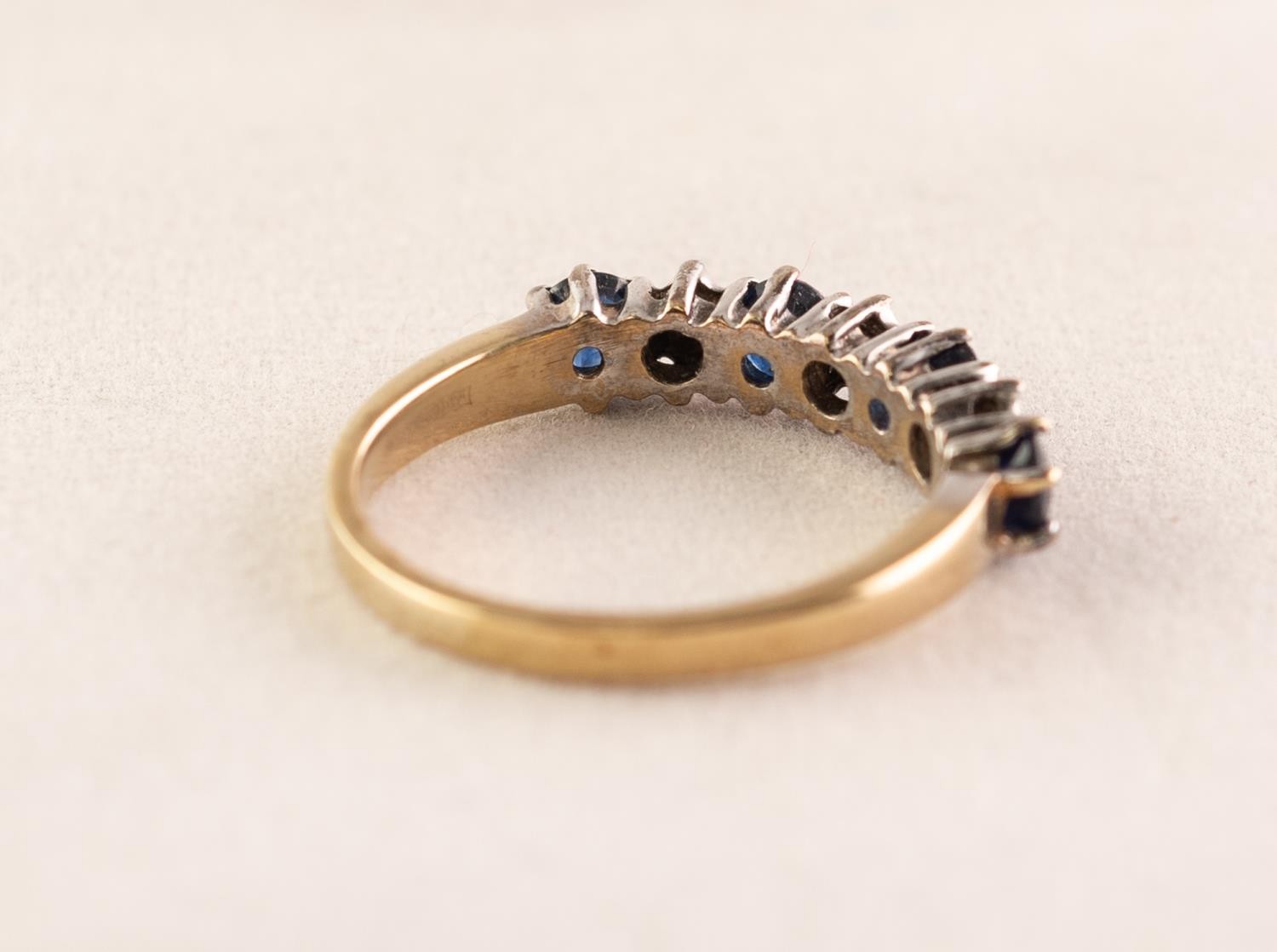 UNMARKED YELLOW GOLD HALF-HOOP RING set with four sapphires and three tiny diamonds,2.4 gms gross - Image 3 of 3