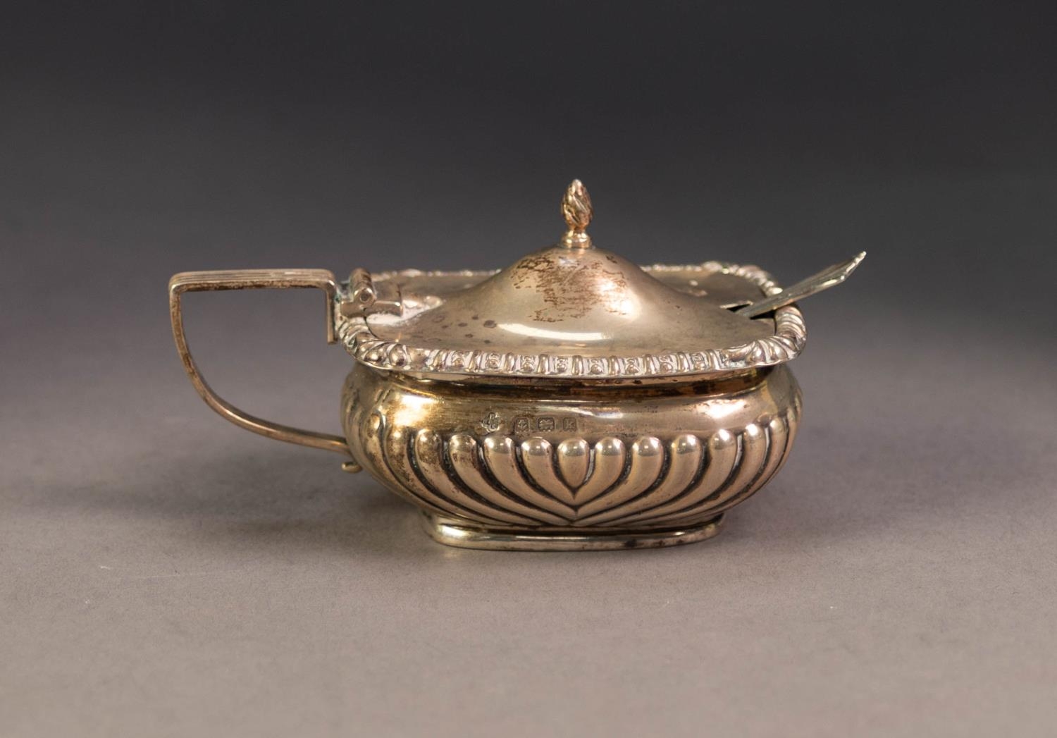 EDWARD VII SILVER MUSTARD RECEIVER, of part fluted, rounded oblong form with angular scroll