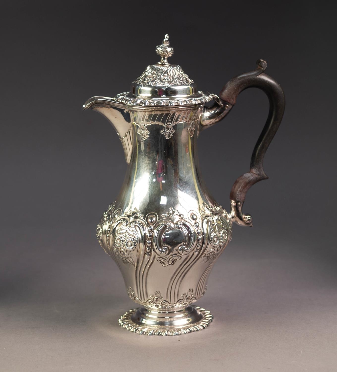 VICTORIAN SILVER PYRIFORM COFFEE POT, repousse with flowers rococo scrolls, the hinged domed lid - Image 2 of 3