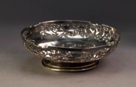 GEORGE VI PIERCED SILVER PEDESTAL SHALLOW DISH, with foliate pierced border and moulded circular