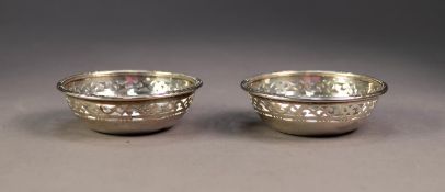 PAIR OF SILVER CIRCULAR SWEET MEAT DISHES, with cut card pierced sides, reed and ribbon borders, 3