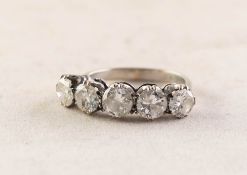 RING SET WITH A ROW OF FIVE ROUND DIAMONDS, in claw settings, approximately 2 1/2ct in total, 3.