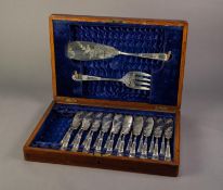 TEN PAIRS OF ELECTROPLATED FISH EATERS AND THE PAIR OF SERVERS, in a matched oak case