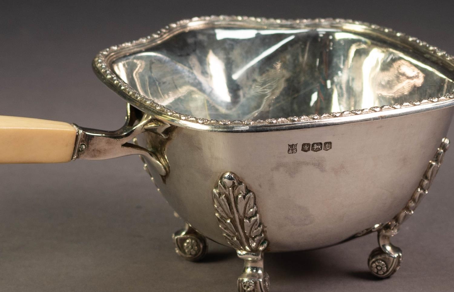 PRE-WAR SILVER BONE HANDLED BRANDY WARMER/POURER with cast floret decorated rim, raised upon four - Image 2 of 2