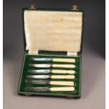 GEORGE VI CASED SET OF SIX AFTERNOON TEA KNIVES WITH SILVER BLADES AND IVORY HANDLES CARVED IN