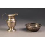 TWO PIECES OF SILVER, comprising: PEDESTAL CREAM JUG, Birmingham 1916, and a SHALLOW DISH WITH
