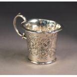 EDWARD VII EMBOSSED SILVER CHRISTENING MUG, of slightly flared form with high double C scroll handle