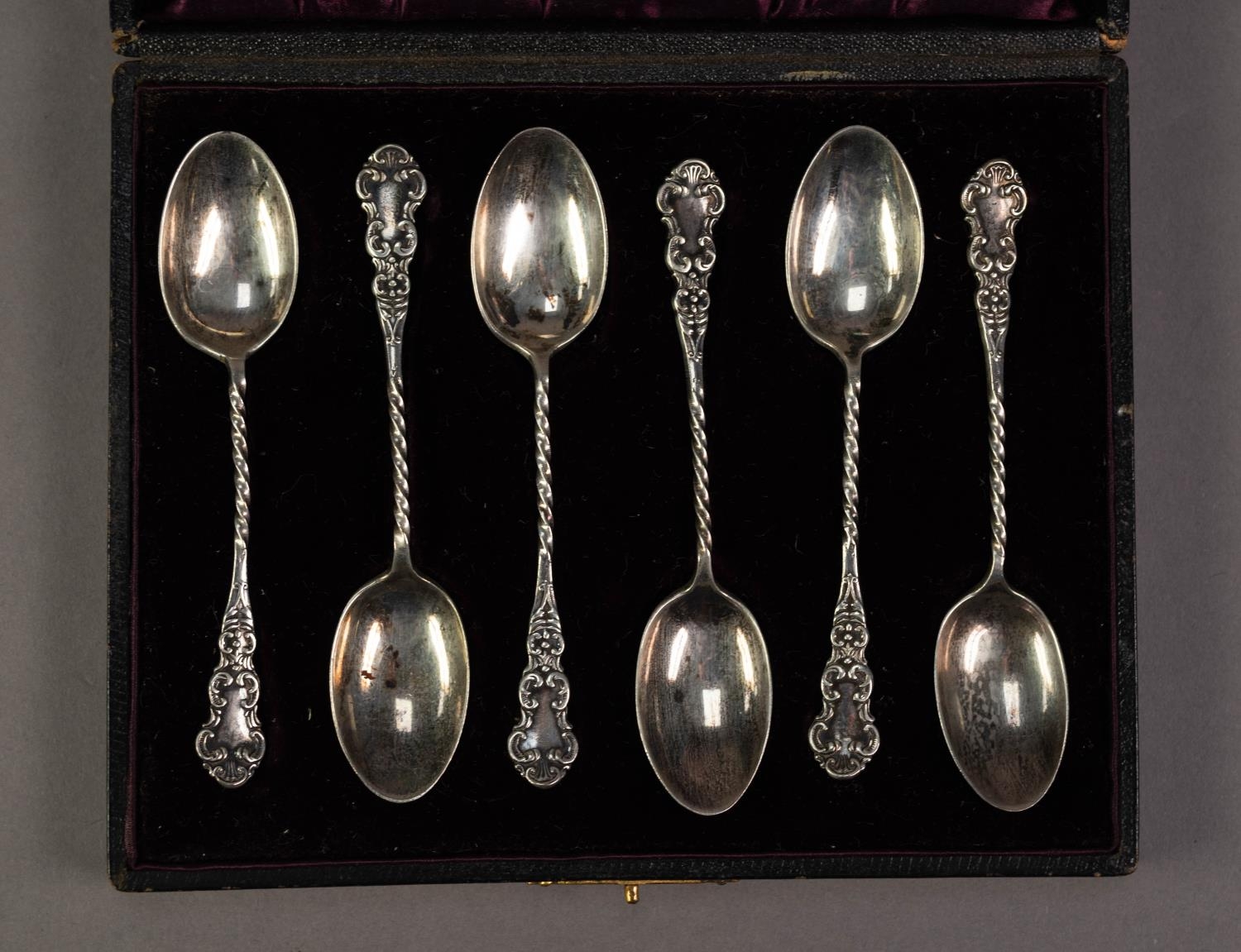 LATE VICTORIAN CASED SET OF SIX SILVER TEASPOONS, with twisted handles and rococo embossed tops, - Image 2 of 2