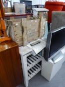 A PAINTED RUSTIC CHOPPING STAND WITH TWO SLATTED SHELVES BELOW, A RUSTIC PLANKED BOX WTIH TOP TOP,