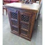 MIDDLE EASTERN STYLE SMALL STAINED WOOD CABINET, WITH TWO DOORS WITH LOZENGE PIERCED/LATTICE