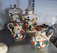 MASONS ?JAVA? PATTERN POTTERY CASED MANTEL CLOCK; MATCHING TEA CADDY AND A PAIR OF MILK JUGS (4)