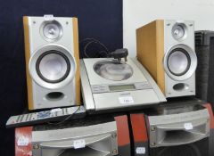 A SHARP MINI AUDIO SYSTEM OF CD PLAYER AND A PAIR OF SPEAKERS