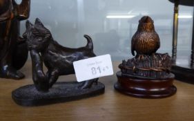 BRONZE SMALL MODEL OF A ROBIN, and a PATINATED COMPOSITION MODELS OF A SCOTTIE DOG with tam o