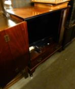 AN INLAID MAHOGANY TELEVISION CABINET AND A FLAT SCREEN TELEVISION