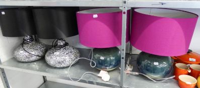 TWO SILVERED GLASS TABLE LAMPS WITH BLACK SHADES AND TWO BLUE/GREEN POTTERY TABLE LAMPS WITH