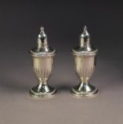 PAIR OF 'STERLING' PATENT WEIGHTED PEPPER AND SALT RECEIVERS, with glass liner, urn shaped with