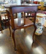 A MAHOGANY SQUARE SHAPED OCCASIONAL TABLE, WITH SERPENTINE OUTLINE AND UNDER SHELF