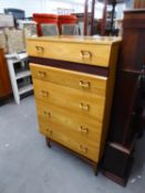 A STYLISH LIGHTWOOD CHEST OF FIVE DRAWERS