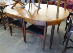 A 1960's DANISH EXTENDING DINING TABLE, WITH FOLD-AWAY LEAF AND A SET OF FOUR THREE LEGGED DINING