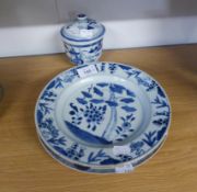 THREE NINETEENTH CENTURY CHINESE NANKIN BLUE AND WHITE PLATES AND A SIMILAR POT AND LID (A.F.)