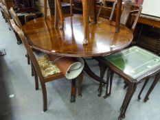 A MAHOGANY REGENCY REPRODUCTION EXTENDING OVAL DINING TABLE, ON COLUMN AND QUARTETTE SUPPORTS