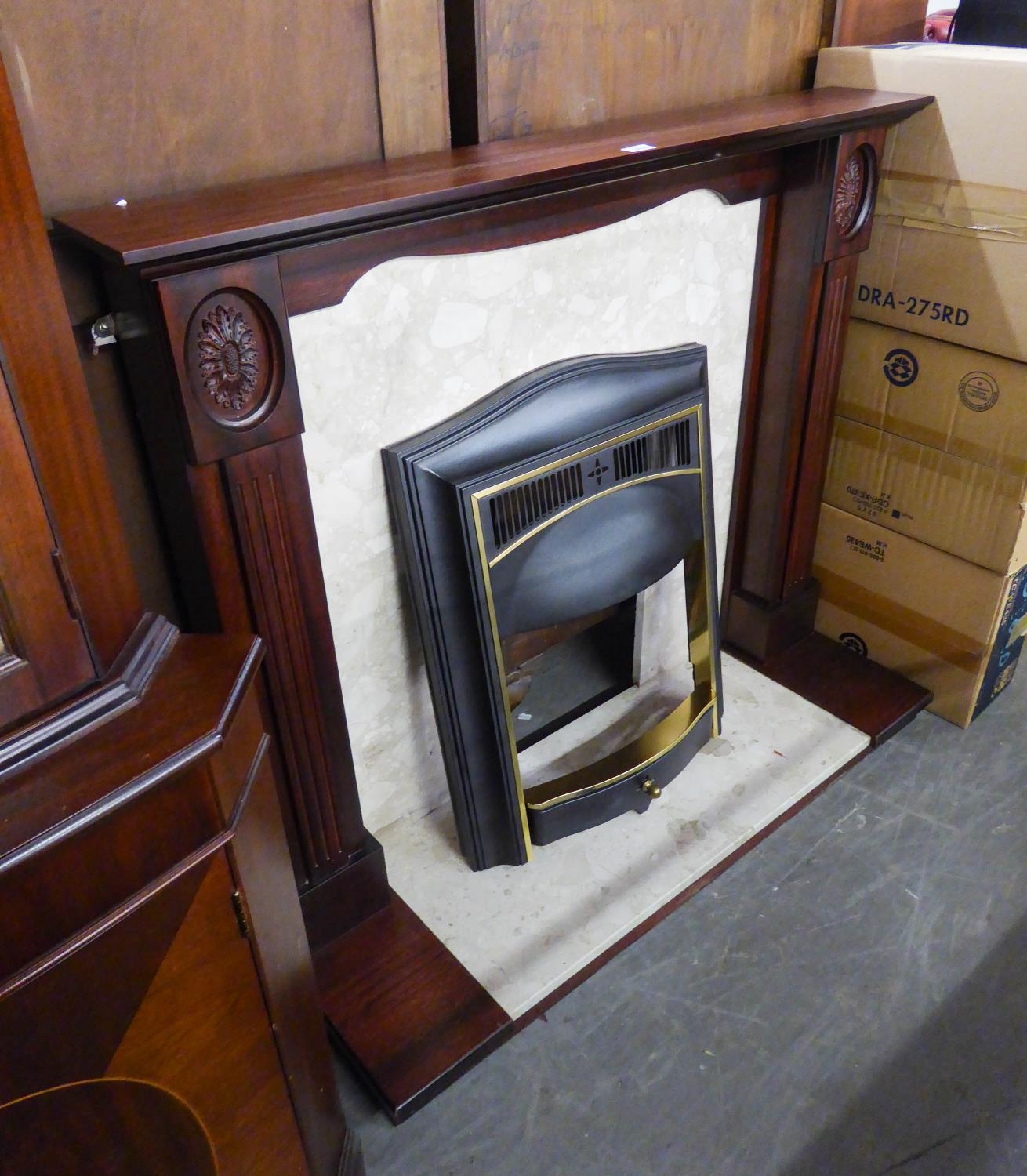 A MAHOGANY FIRE SURROUND WITH MARBLE INSET AND HEARTH AND BLACK AND BRASS FIRE GRATE