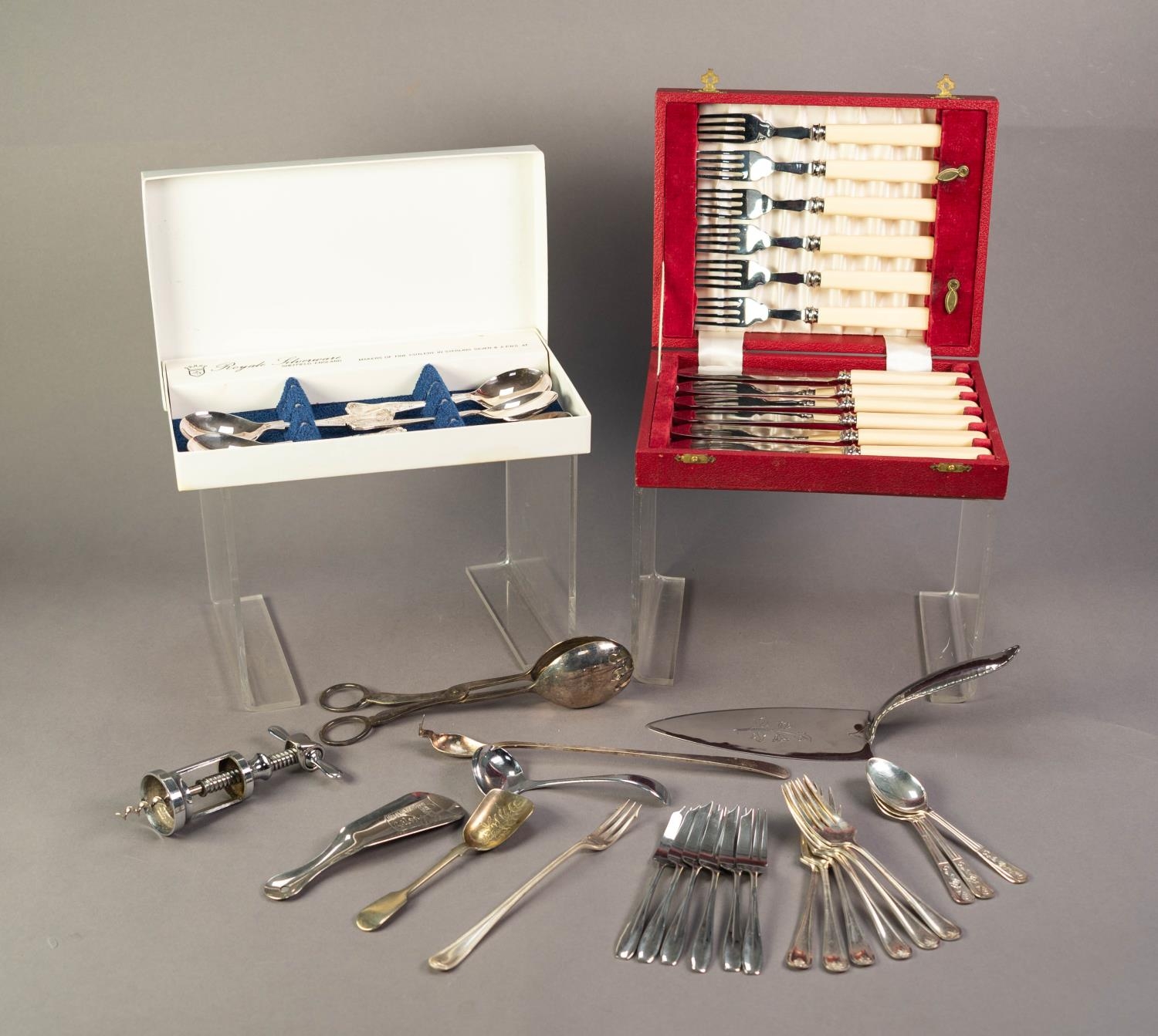 CASED SET OF SIX PAIRS OF STAINLESS STEEL FISH EATERS WITH BONE HANDLES, together with a SET OF FIVE