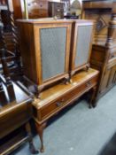 DYNATRON RADIOGRAM, IN MAHOGANY FLOOR STANDING CABINET ON CABRIOLE LEGS AND THE PAIR OF LOUDSPEAKERS