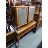 DYNATRON RADIOGRAM, IN MAHOGANY FLOOR STANDING CABINET ON CABRIOLE LEGS AND THE PAIR OF LOUDSPEAKERS