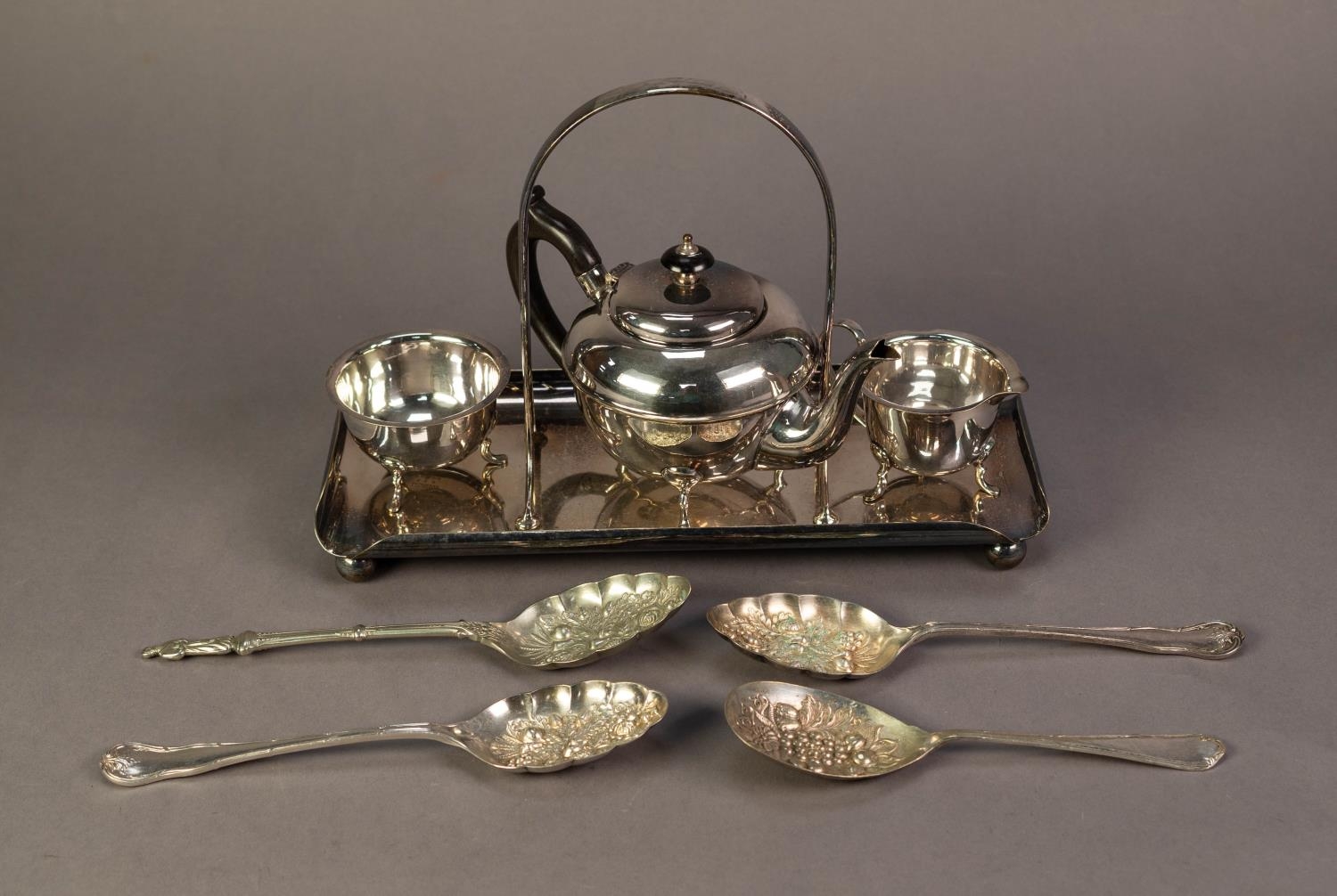 PRE-WAR ELECTROPLATED THREE PIECE TEASET, on oblong stand with fixed carrying handle; a pair of
