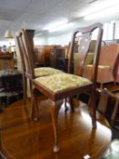 A SET OF FOUR MAHOGANY DINING CHAIRS WITH SPLAT BACKS AND A PAIR OF CHAIRS WITH SHELL CARVED TOP