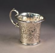 EDWARD VII EMBOSSED SILVER CHRISTENING MUG, of slightly flared form with high double C scroll handle