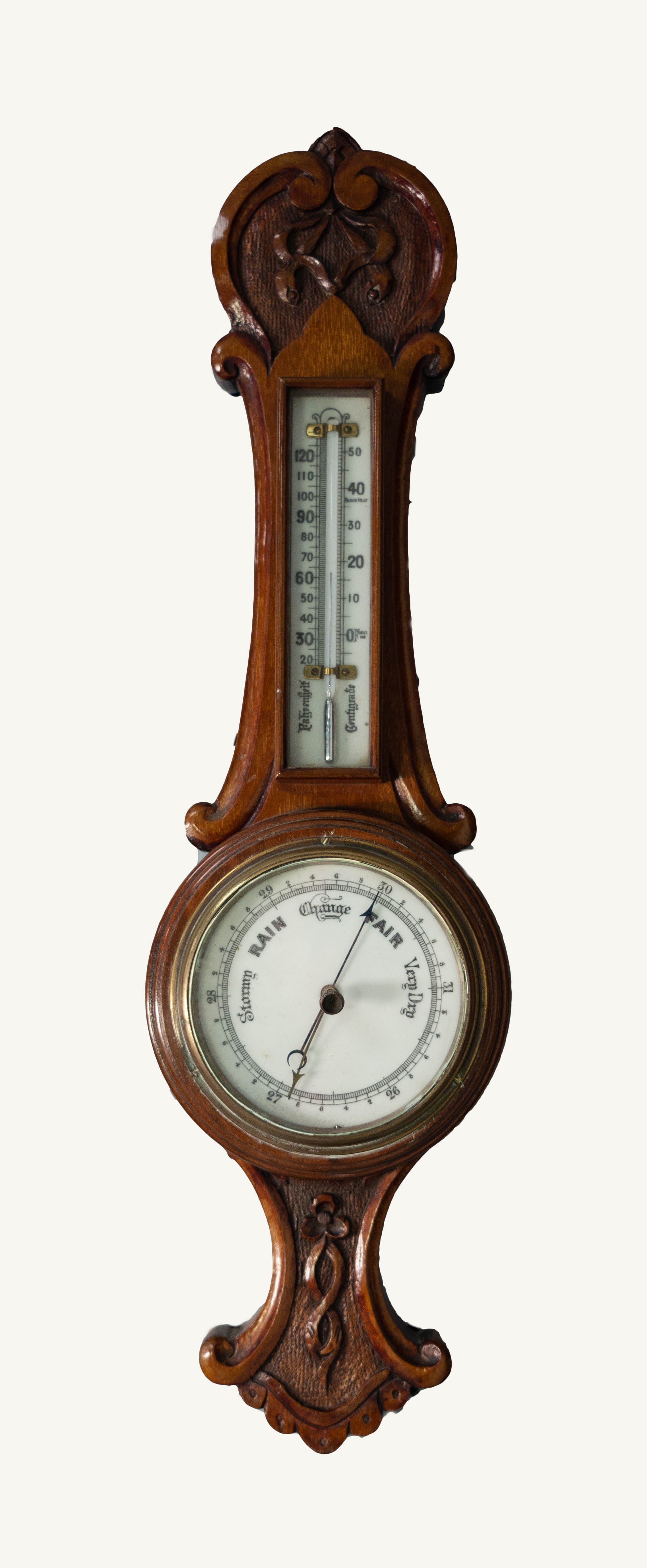 EARLY TWENTIETH CENTURY CARVED MAHOGANY CASED SMALL ANEROID BANJO BAROMETER, the 4 ½? dial set