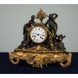 FRENCH LATE NINETEENTH CENTURY SPELTER AND PARCEL GILT MANTEL CLOCK, with eight days movement