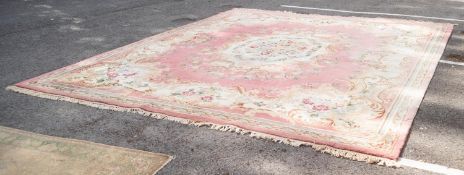 LARGE INDIAN WOOL PILE BORDERED CARPET of Aubusson design with multicoloured flowers, cream and