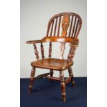 NINETEENTH CENTURY ELM AND FRUITWOOD CHILD?S HIGH BACK WINDSOR ARMCHAIR, of typical form with two