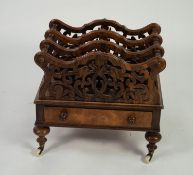 VICTORIAN FIGURED WALNUT THREE DIVISION MUSIC CANTERBURY?, the foliate scroll pierced dividers