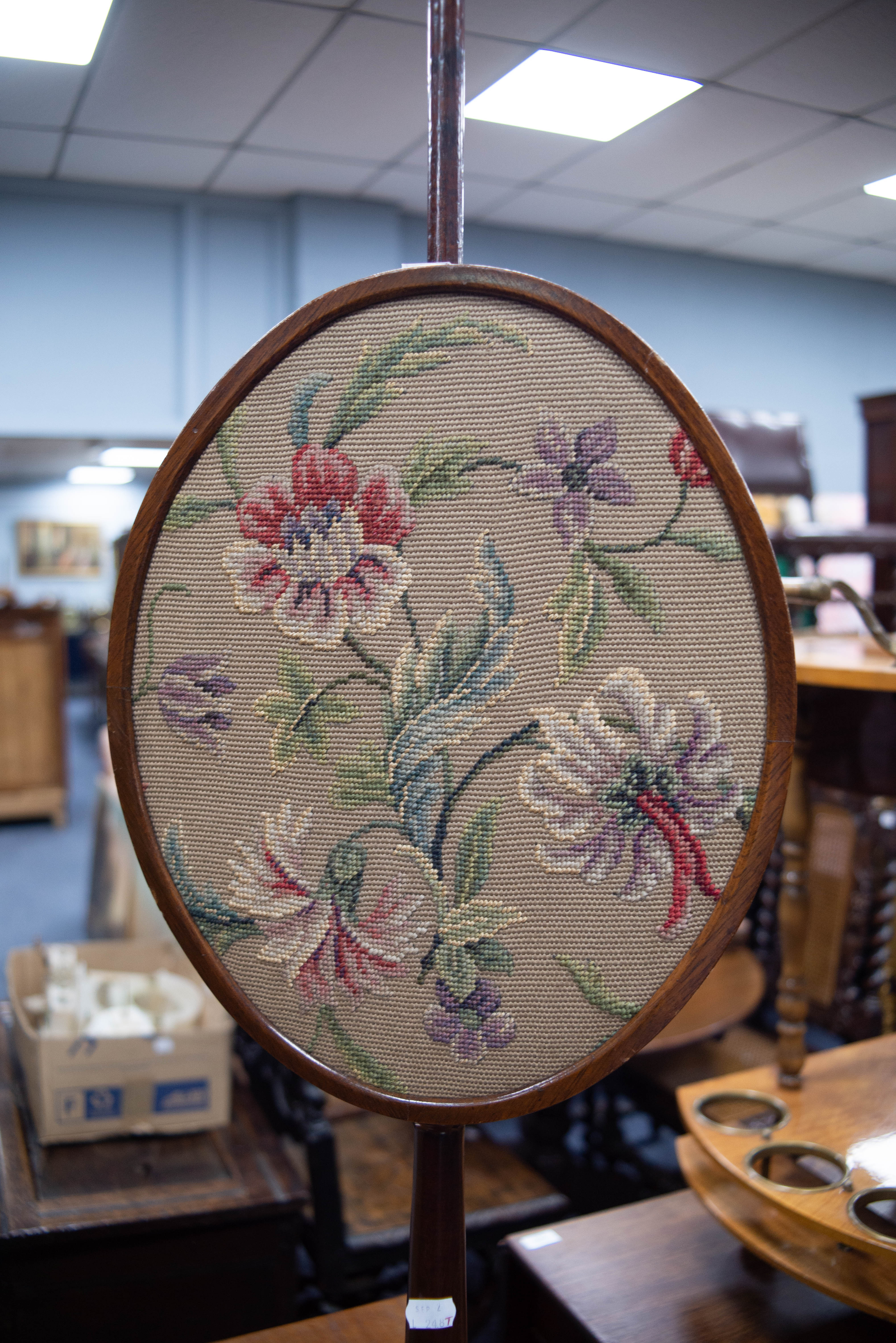 EARLY NINETEENTH CENTURY MAHOGANY AND STAINED FRUITWOOD POLE SCREEN, with adjustable oval panel - Image 2 of 2