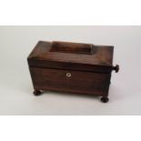 VICTORIAN ROSEWOOD TEA CADDY, of sarcophagus form with turned side handles and feet, the interior