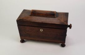 VICTORIAN ROSEWOOD TEA CADDY, of sarcophagus form with turned side handles and feet, the interior