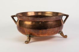 HEAVY COPPER TWO HANDLED CAULDRON PATTERN SHALLOW JARDINIÈRE, with brass scroll feet, 6? (15.1cm)