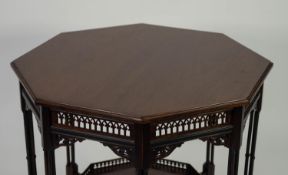 EDWARDIAN CARVED MAHOGANY OCTAGONAL OCCASIONAL TABLE, the moulded top above an arch pierced
