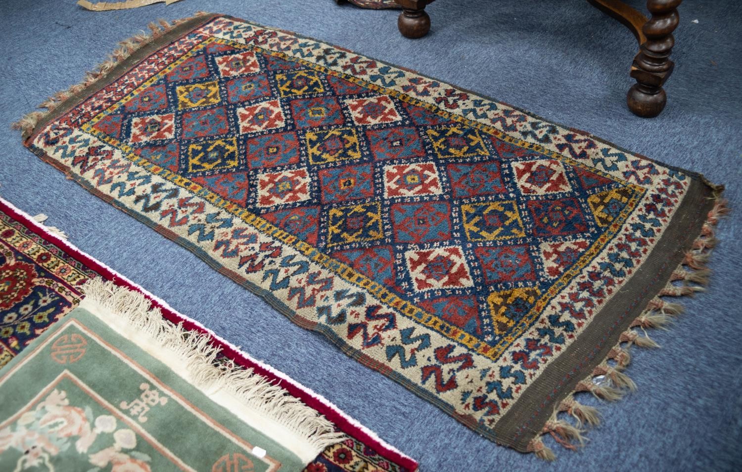 SHIRAZ RUG, with all-over diamond shaped tile pattern, the principal border white with repeat double - Image 2 of 2