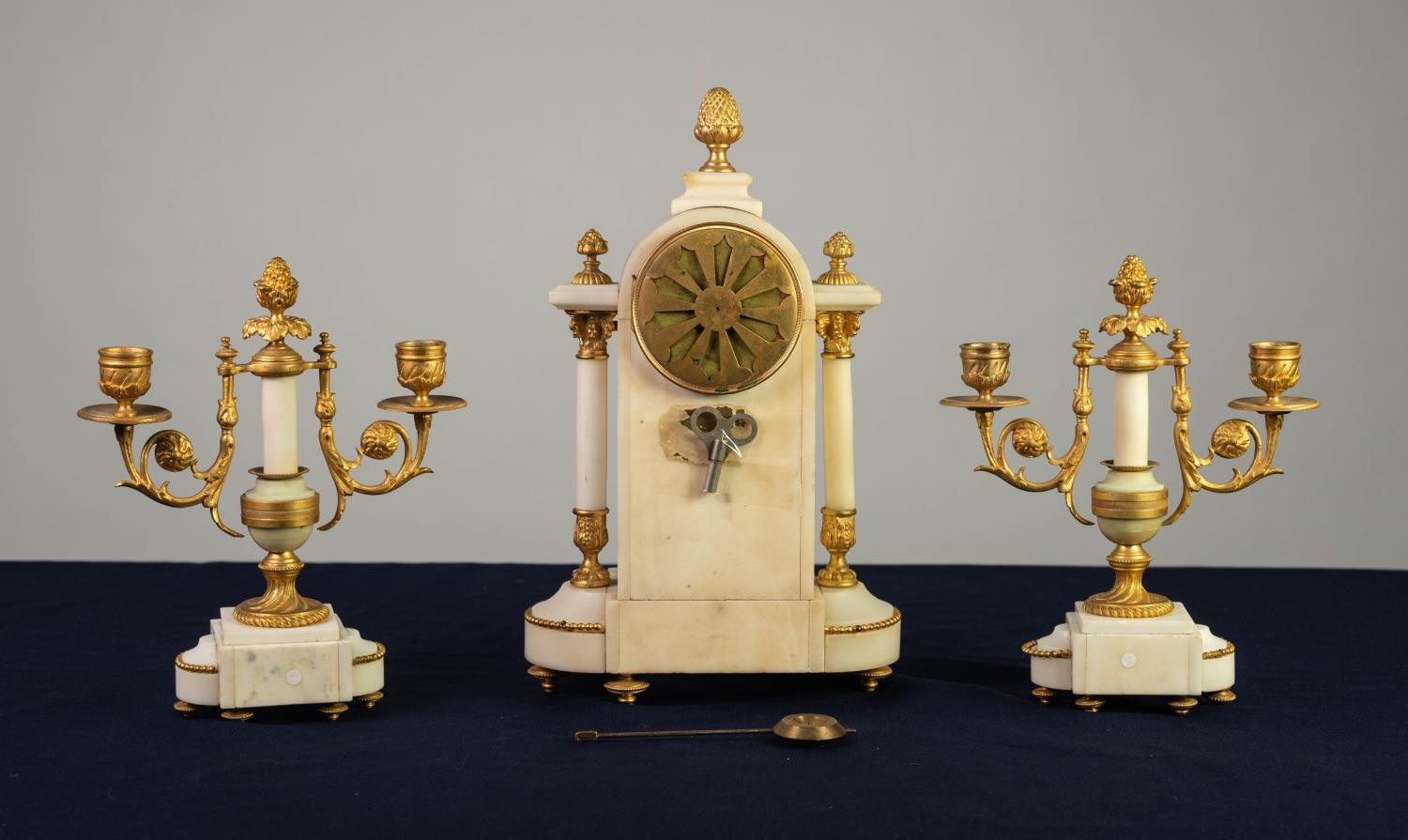 LATE NINETEENTH CENTURY FRENCH GILT METAL MOUNTED WHITE MARBLE THREE PIECE CLOCK GARNITURE, the - Image 2 of 2