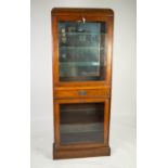 HARPER AUTOMATICS OF CROYDON, 1930?s OAK SHOP DISPLAY CABINET, the upper section with fall front