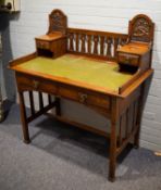 ARTS AND CRAFTS CARVED OAK AND POLLARD OAK WRITING TABLE, the oblong, top with green leather