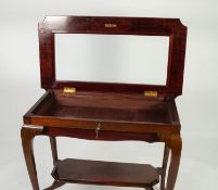 TWENTIETH CENTURY MAHOGANY BIJOUTERIE TABLE, the moulded oblong top with inverted corners and oblong