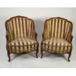 PAIR OF LATE NINETEENTH CENTURY FRENCH WALNUT BERGERE CHAIRS, each with moulded show wood frame with