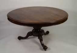 EARLY NINETEENTH CENTURY ROSEWOOD TILT TOP DINING TABLE, the moulded circular top above a heavy